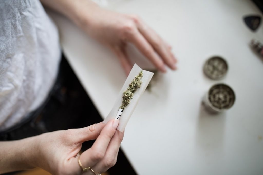 rolling weed joint and grinder